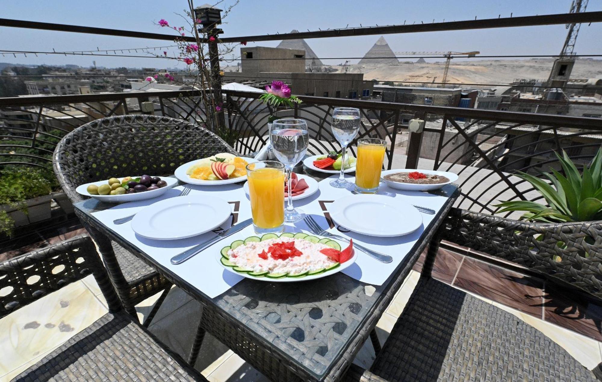 Pyramids Gem Plaza Kafret el-Gabal Exterior foto